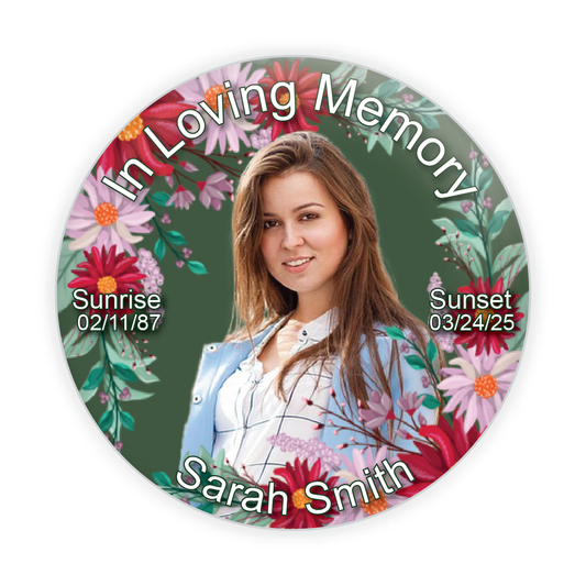 Custom tribute pin with floral design on a green background, representing renewal and memory.